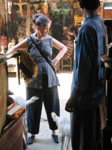 Olga admiring local wares at the market